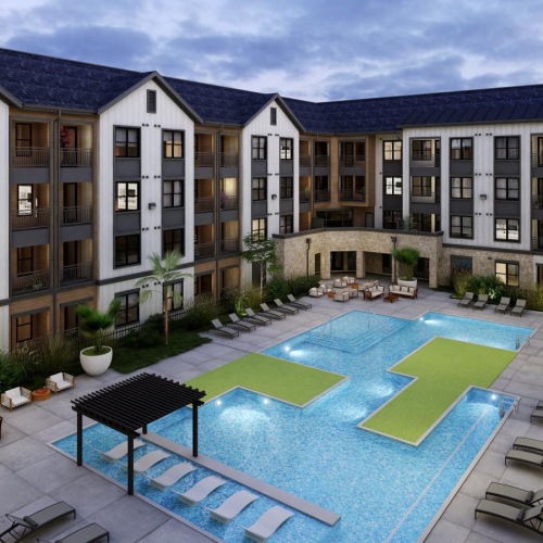 a large building with a pool